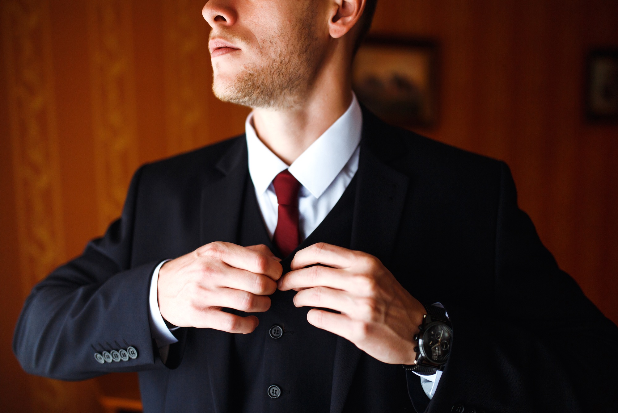 Luxury groom in suit. Businessman. Morning Groom Fees. beginning of the wedding day. Men's fashion.